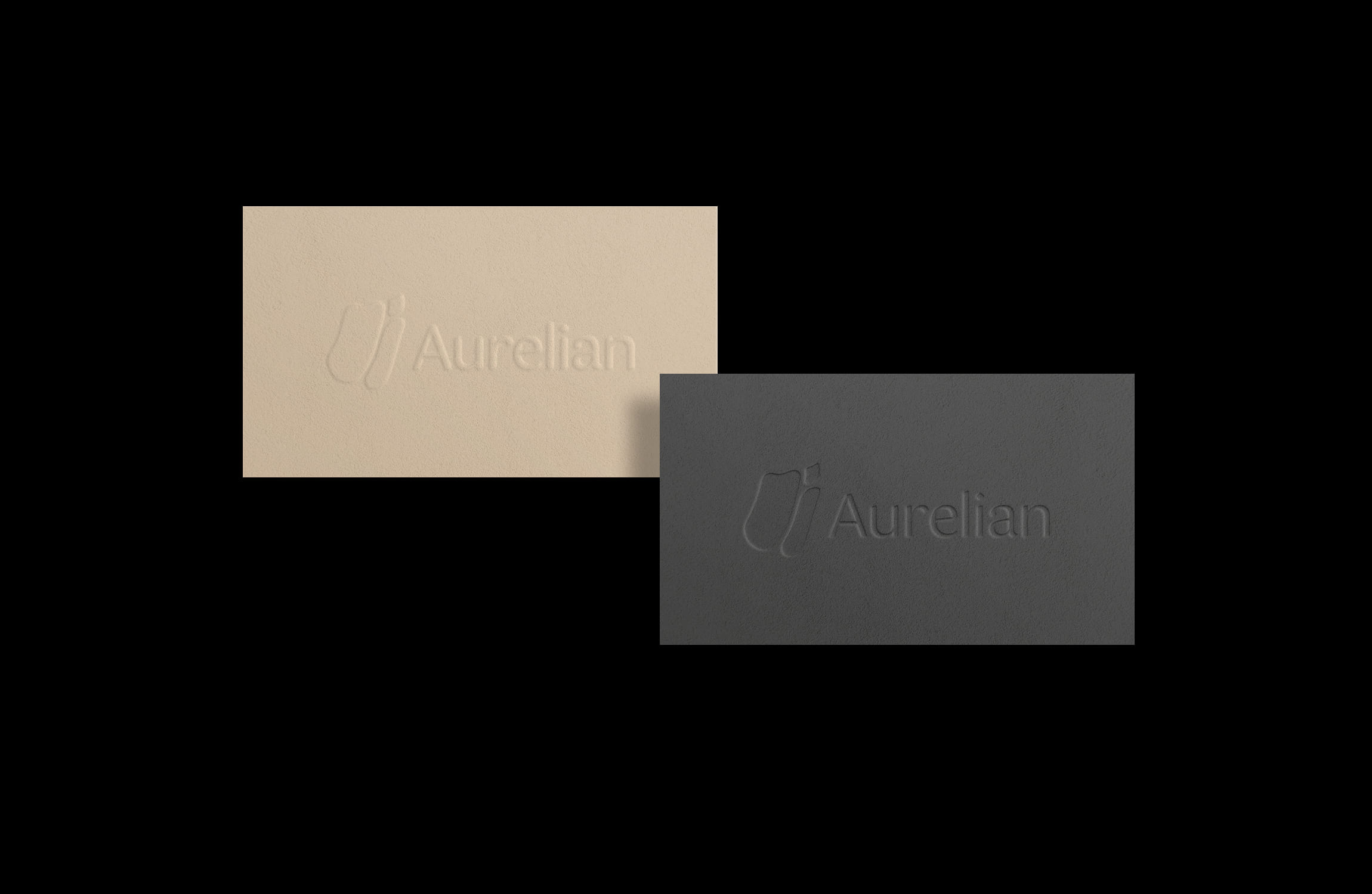 Embossed beige and black business cards with the text Aurelian and a subtle logo, set against a black background, conveying elegance and professionalism.