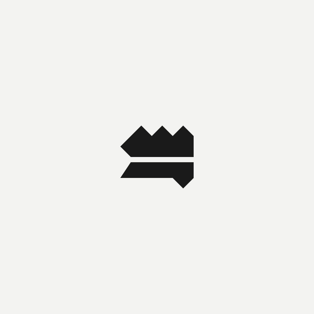 Minimalist black abstract logo shape resembling a stylized set of three houses on a plain white background, conveying simplicity and modernism.