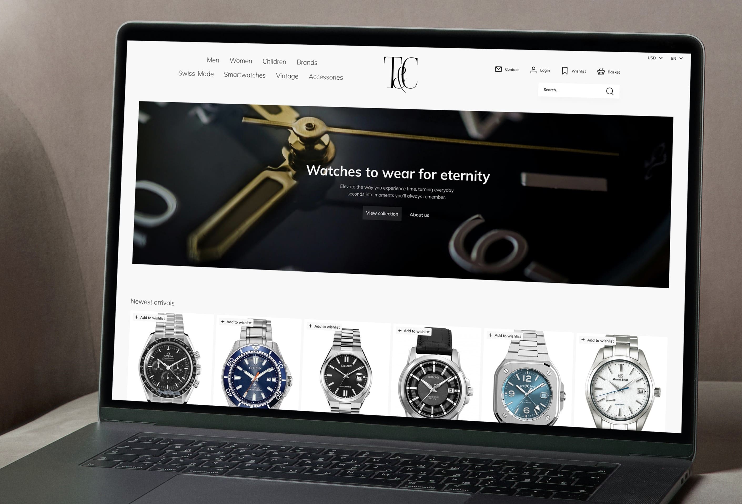 Laptop displaying an e-commerce wristwatch website on a beige couch. The screen shows luxury watches with a headline reading - Watches to wear for eternity.